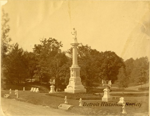 This monument--seen here in a c. 1880 photo--was erected by the Firemen's Fund in 1876. The surrounding lot is still reserved for members of the organization.