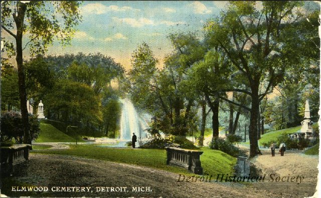 A tranquil scene from Detroit's Elmwood Cemetery decorates this 1914 postcard.